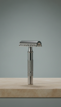 Stainless steel safety razor with weighted handle